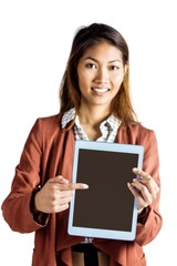 Naklejka premium Smiling businesswoman pointing a tablet
