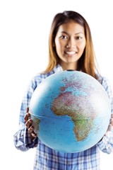 Smiling asian woman holding a globe