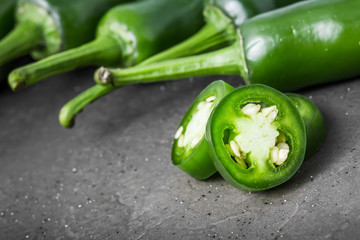Jalapeno hot green pepper background.