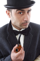man with a tobacco pipe and hat bowler