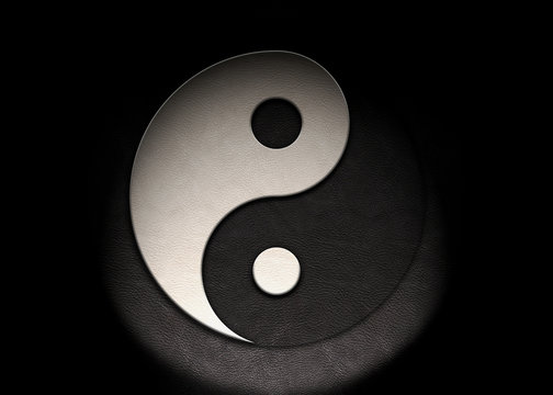 Yin Yang symbol in a smooth, dark black and a bright white leather texture with lighting from bottom center