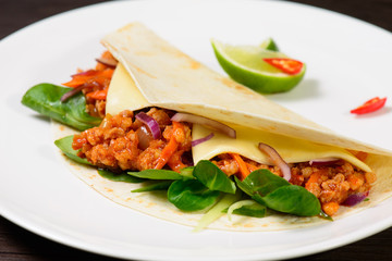 Tacos on a white plate