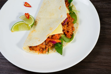 Tacos on a white plate