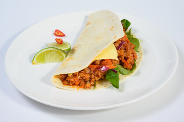 Tacos on a white plate