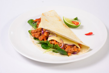 Tacos on a white plate