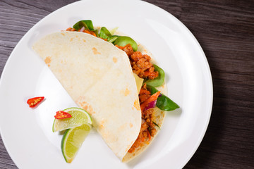 Tacos on a white plate