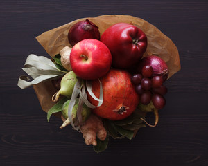 Gift for anyone who leads the right way of life. Fruits and vegetables in the form of a bouquet onblack background
