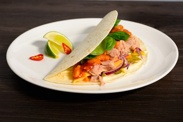 Tacos on a white plate