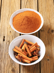 Cinnamon sticks and powder and star anise