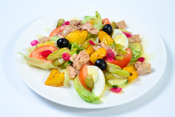 salad with meat,egg, tomatoes, olives and vegetables