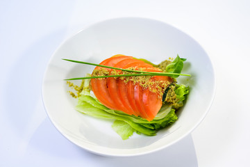 classic Caprese salad with tomatoes, cheese, herbs and sauce