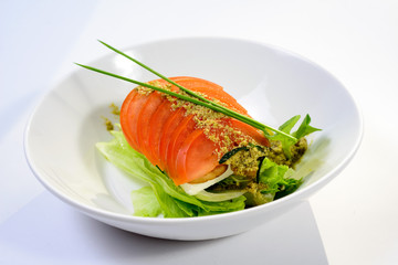 classic Caprese salad with tomatoes, cheese, herbs and sauce