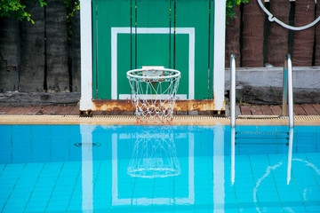 Basketball hoop in swiming pool