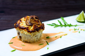 Souffle of chicken in cheese sauce