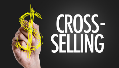 Hand writing the text: Cross-Selling