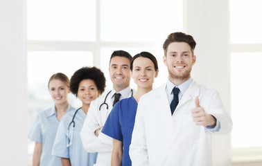 group of happy doctors at hospital