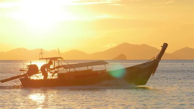 Longtail tourist boat on coast of Thailand sea. Asia tourism travel background