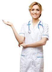 Woman doctor standing on white background