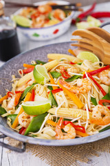 Healthy shrimp and vegetables stir-fry in a bowl, brightly lit