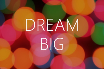 Dream big text on colorful bokeh background