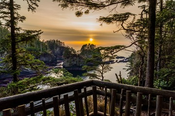 A beautiful sunset on the ocean among the rocks, Cape flattery trail , Olympic Peninsula, Washington state - obrazy, fototapety, plakaty