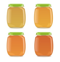 Four glass jars with baby food