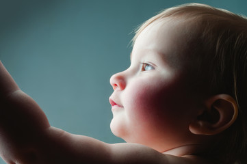 child on dark background