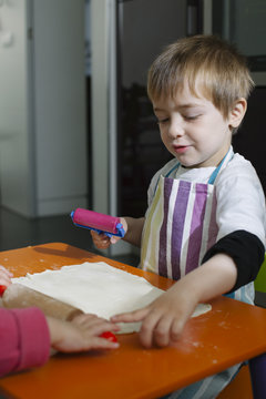 Child cooking dough