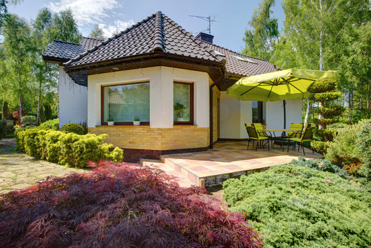 Relaxation space beside modern villa