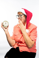 An old woman in a santa hat