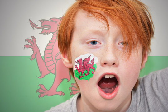 Redhead Fan Boy With Welsh Flag Painted On His Face