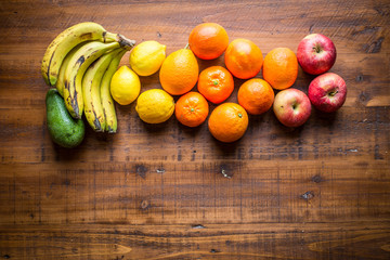 mix of fruits on wooden table