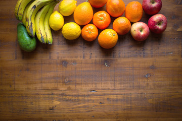 mix of fruits on wooden table