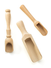 wooden spice scoop on white
