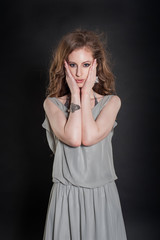 the girl in a gray dress