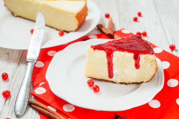 
pastries, desserts , curd pudding with milk,cottage cheese casserole , cinnamon and red strawberry or cherry jam on a wooden background