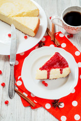 
pastries, desserts , curd pudding with milk,cottage cheese casserole , cinnamon and red strawberry or cherry jam on a wooden background