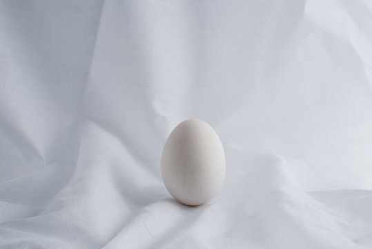 white egg on vintage background.