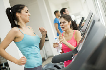 Fototapeta premium Young people training in the gym