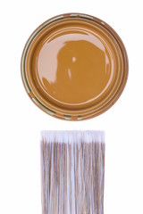 Top view brown paint can with brush isolated on white background