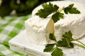 
healthy food. cottage cheese on a white wooden background