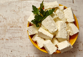 
healthy food. cottage cheese on a white wooden background