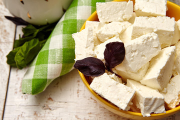
healthy food. cottage cheese on a white wooden background