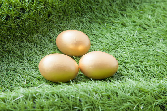 three golden easter eggs
