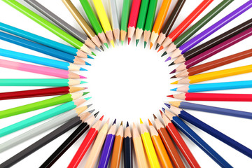 Drawing colourful pencils on a white background, close up