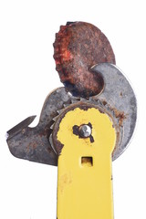 Old rusty can bottle with can opener tool isolated on white background