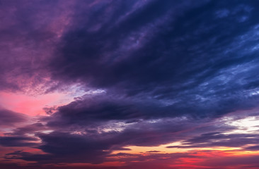 Naklejka na ściany i meble red sunset withl clouds