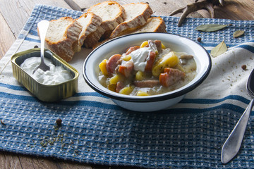 Polish sour soup with sausage.