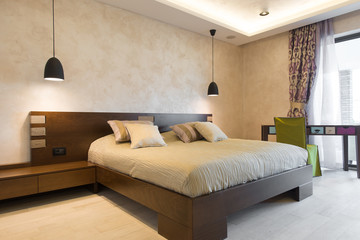 Double bed in modern bedroom interior - obrazy, fototapety, plakaty