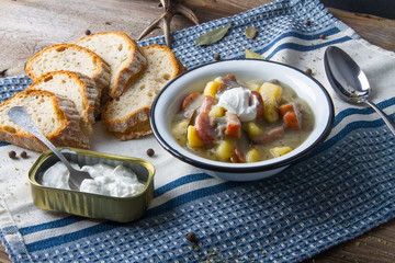 Polish sour soup with sausage.